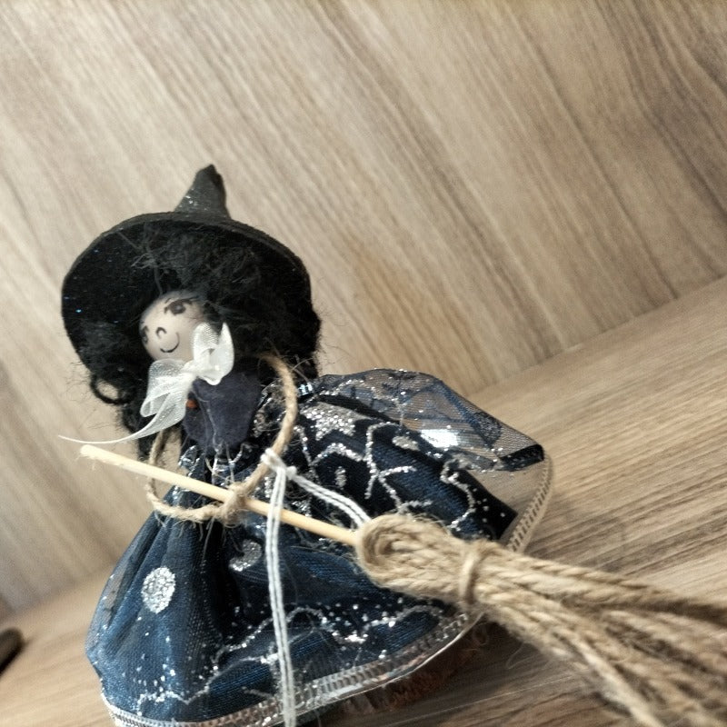 Bambolina streghetta capelli neri vestito blu fiocco bianco